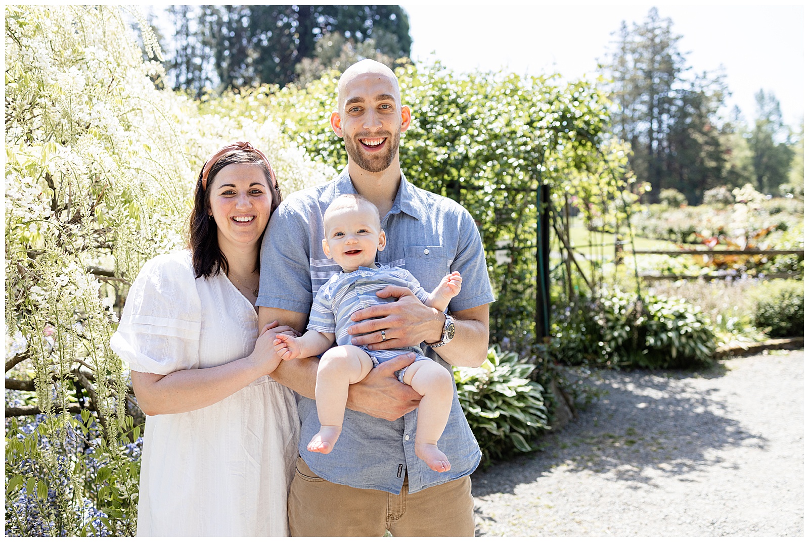 Family of 3 during 6 month milestone photos at Point Defiance Park in Tacoma, WA